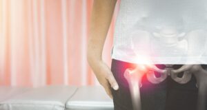 Image showing hip pain radiating from a younger person's hip